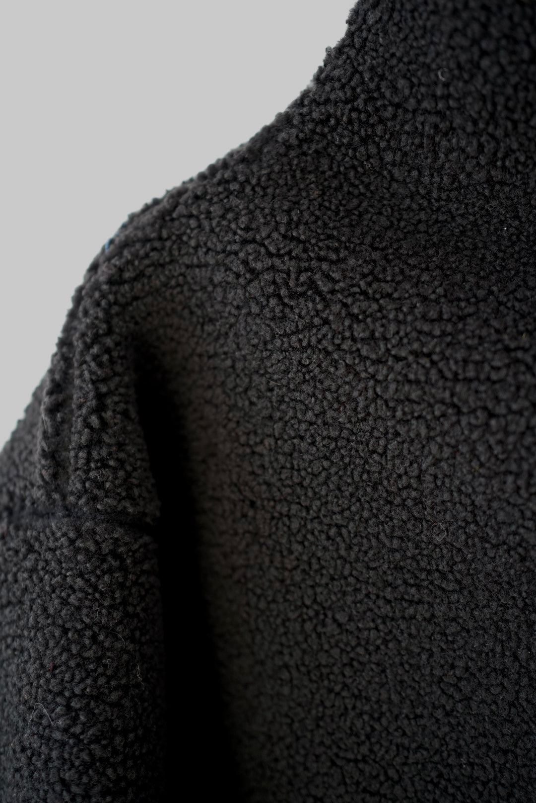 Black sherpa funnel neck top