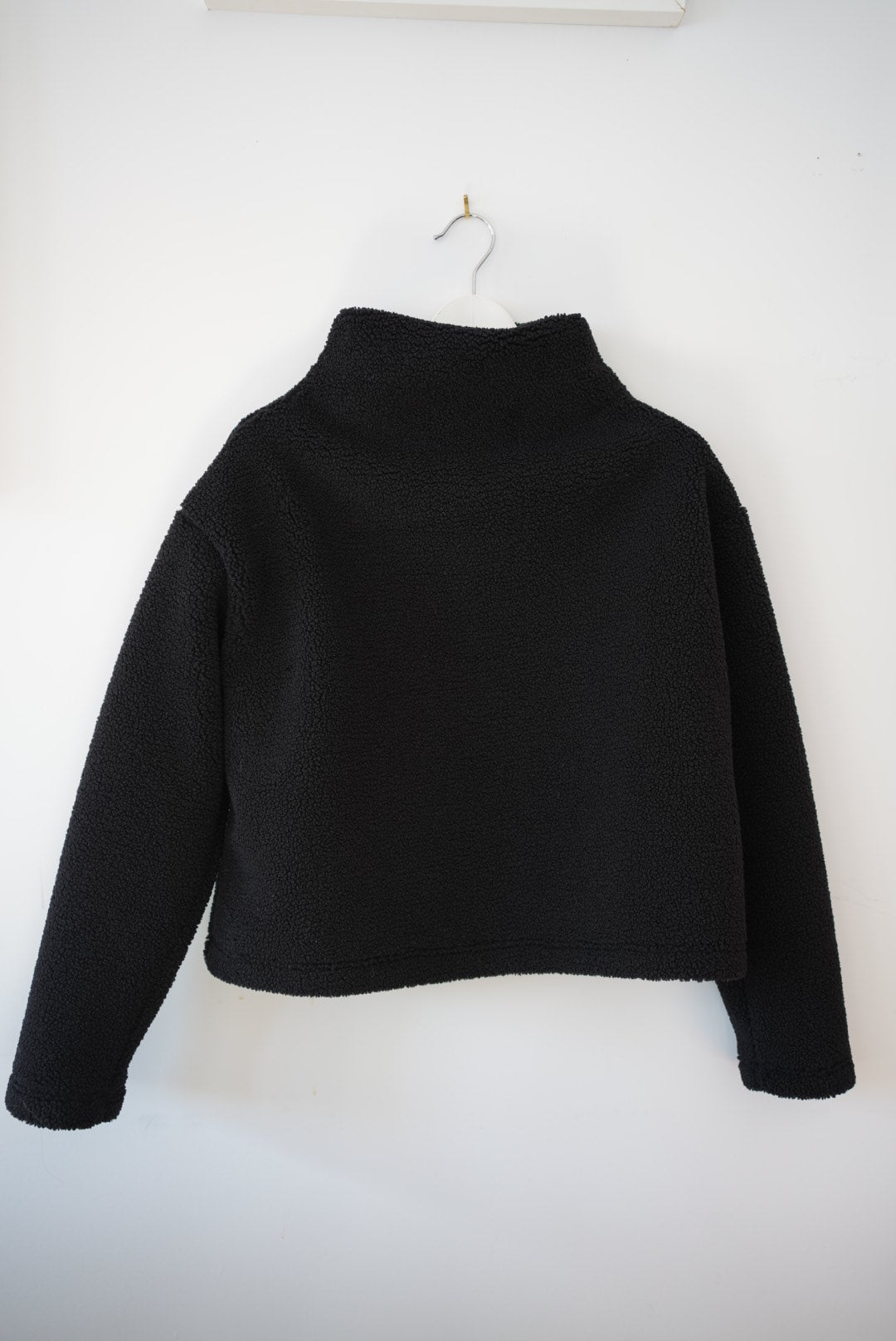 Black sherpa funnel neck top