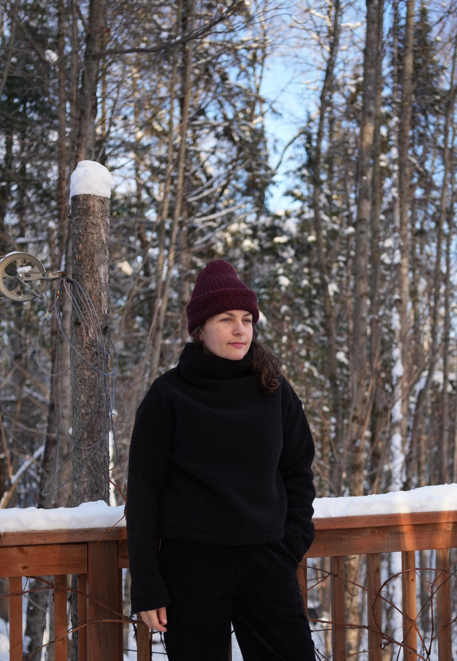 Black sherpa funnel neck top