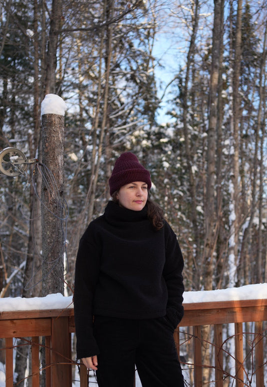 Black sherpa funnel neck top