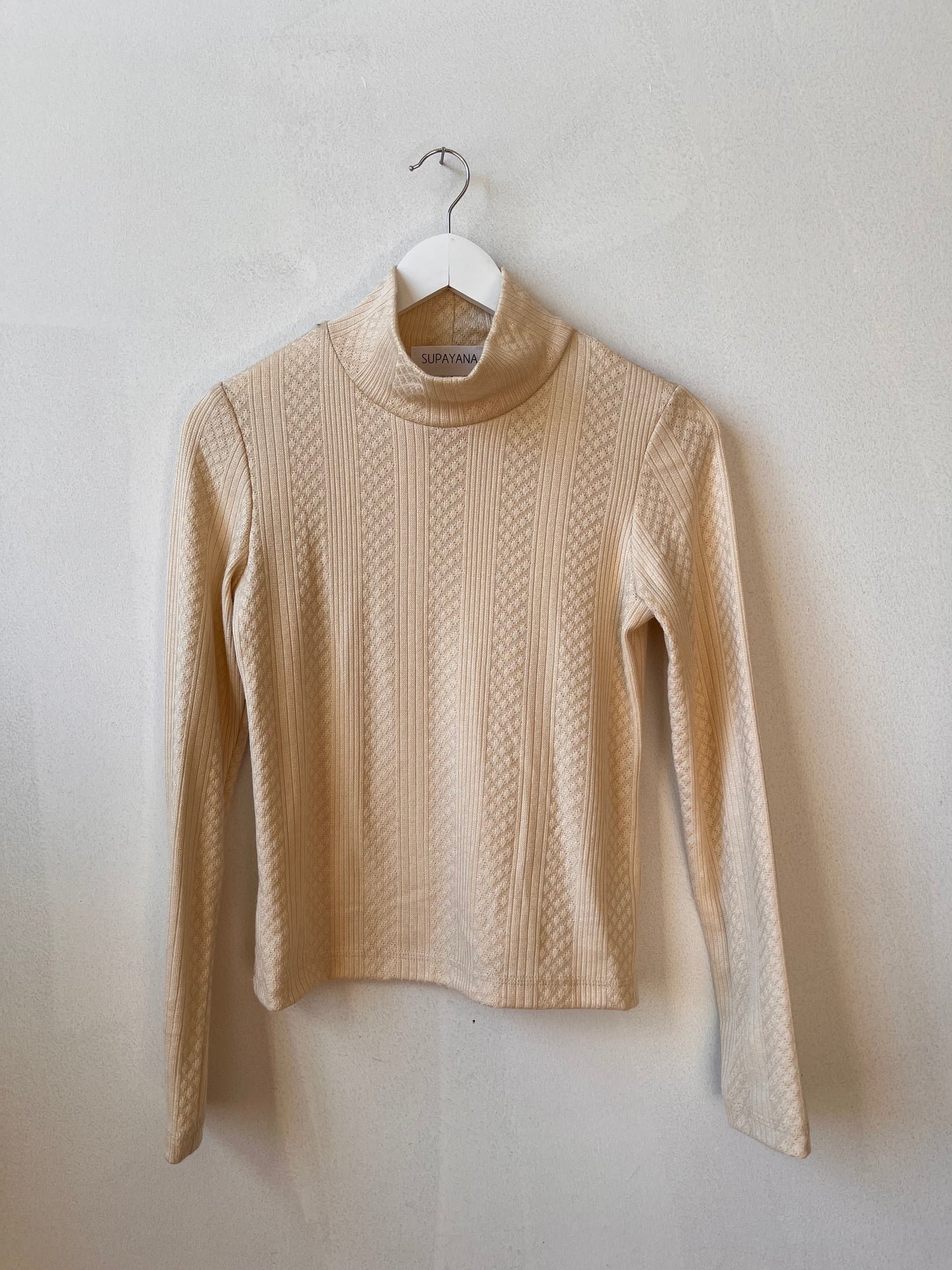 Creamy pointelle turtleneck