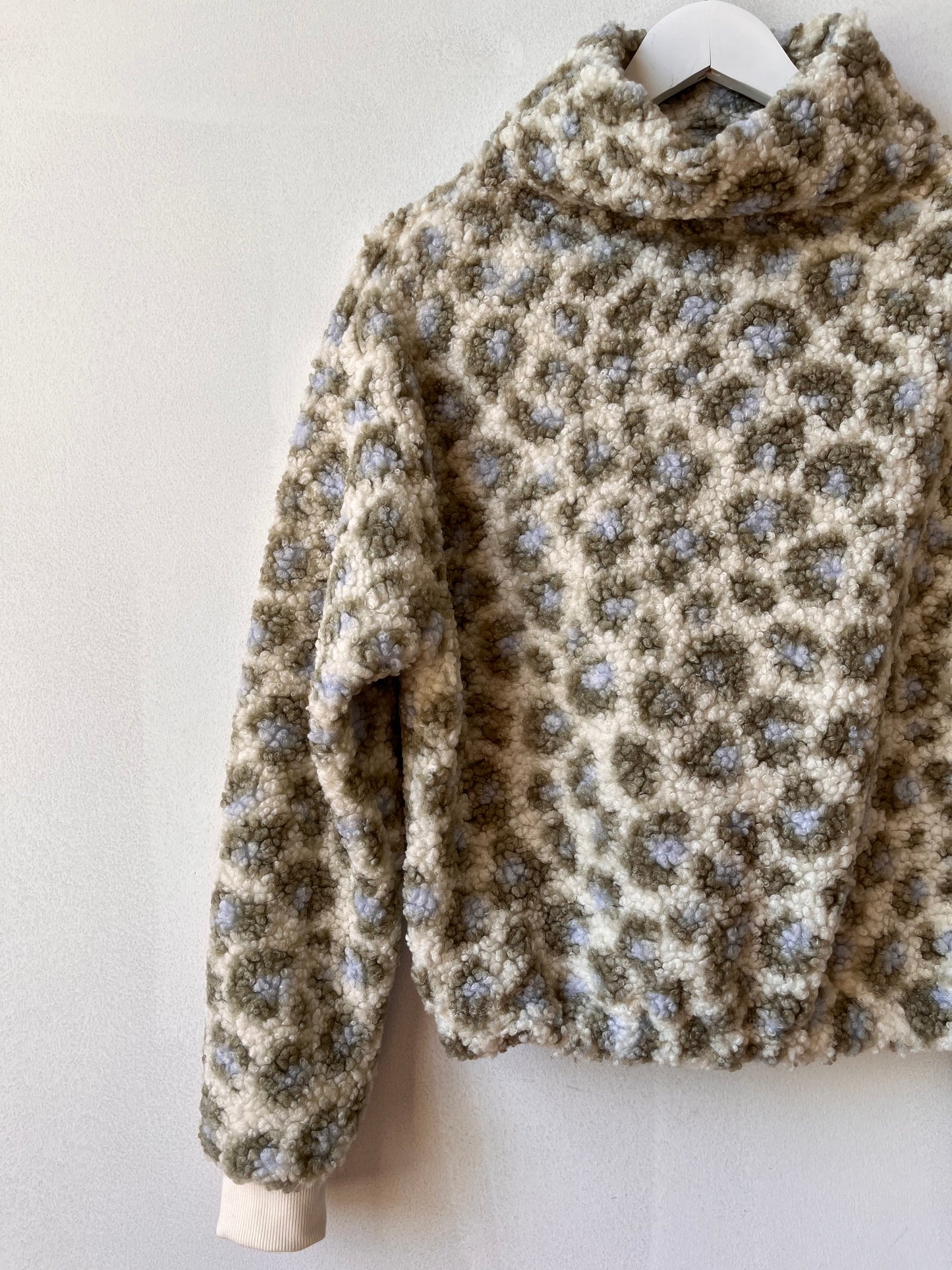 Leopard funnel neck sherpa top with organic cotton lining