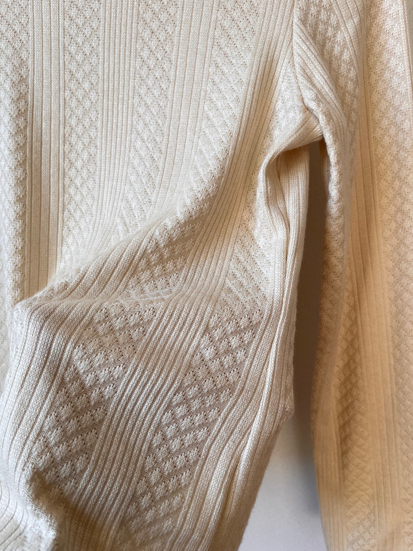 Creamy pointelle turtleneck