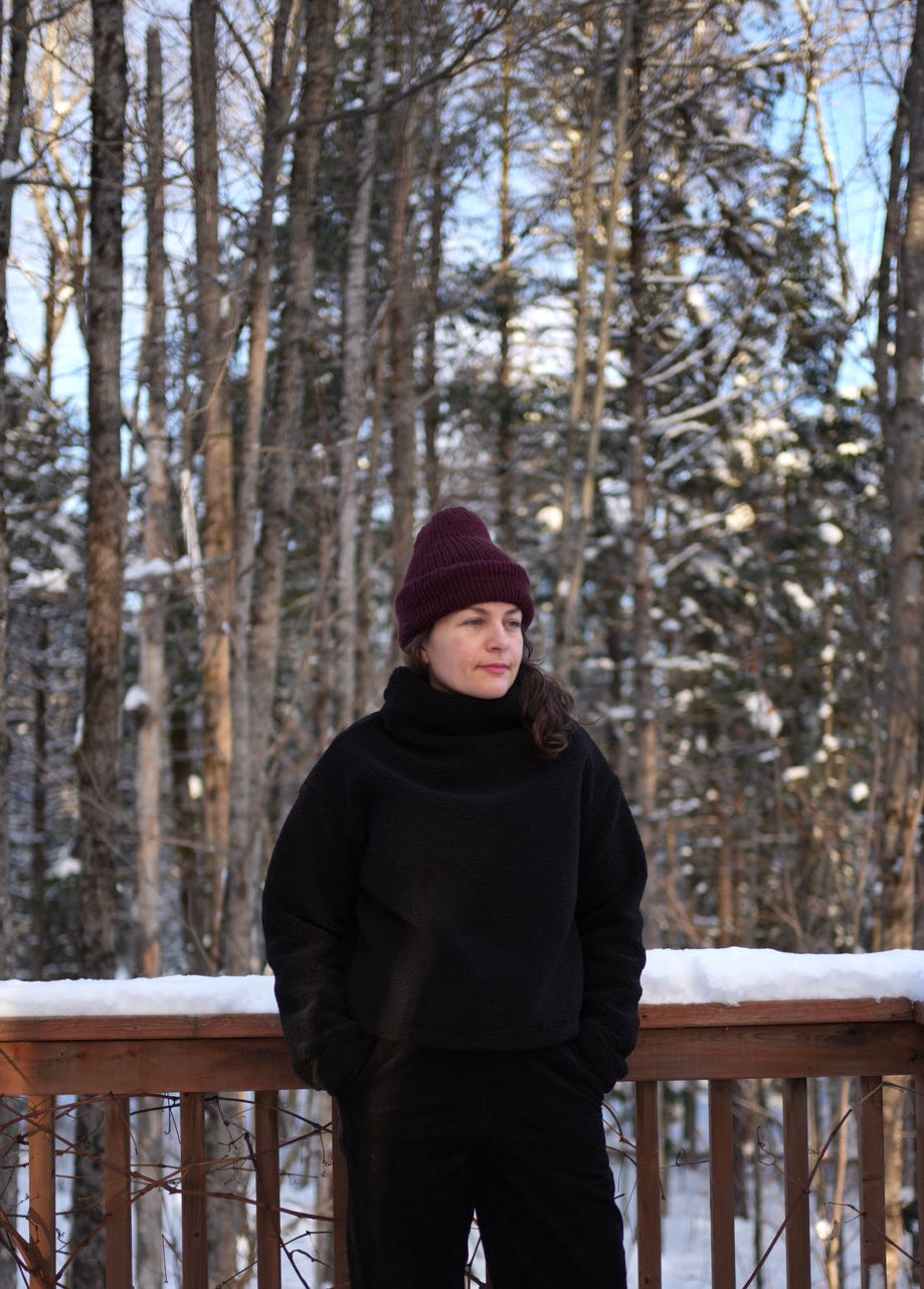 Black sherpa funnel neck top