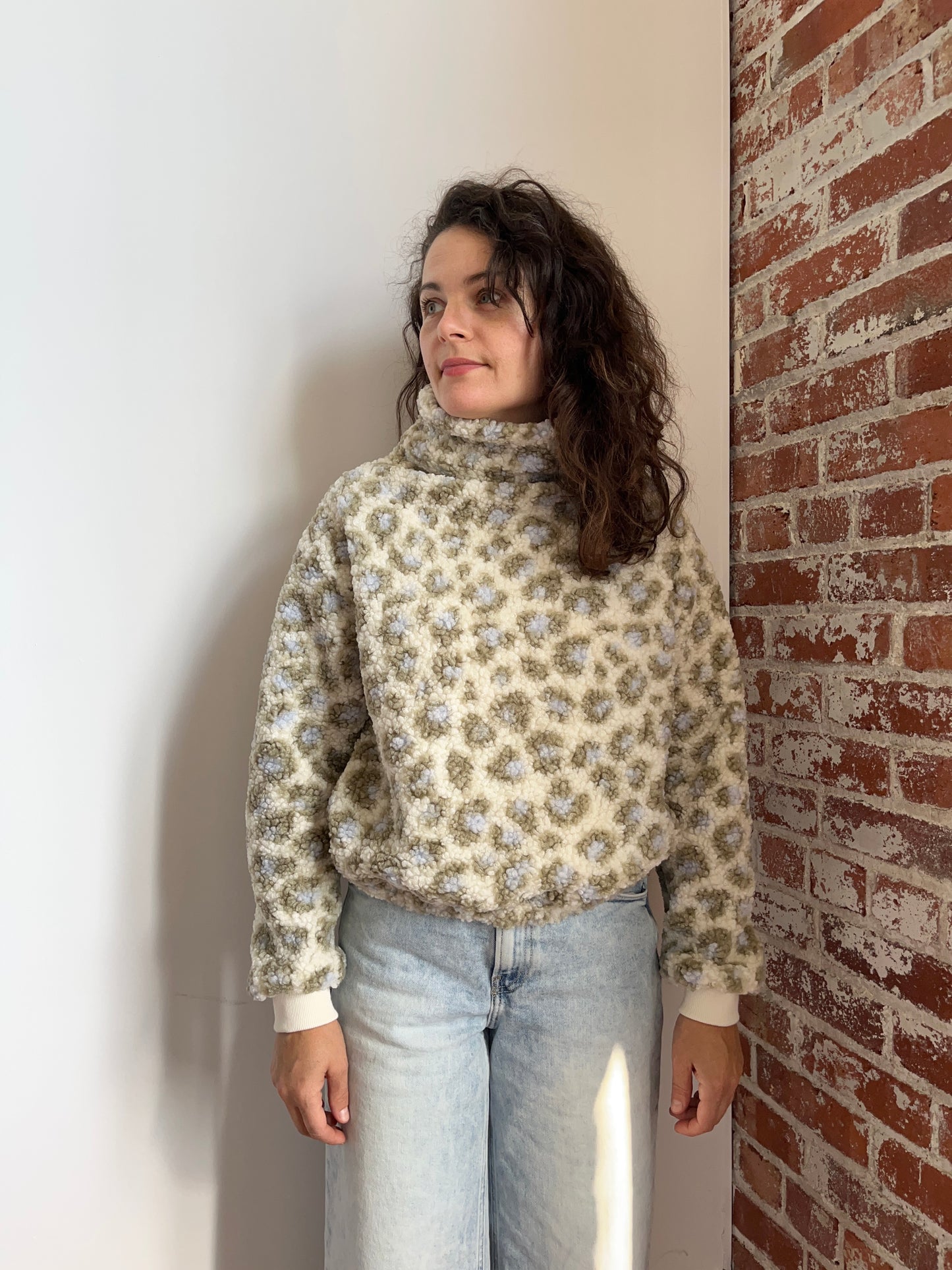 Leopard funnel neck sherpa top with organic cotton lining