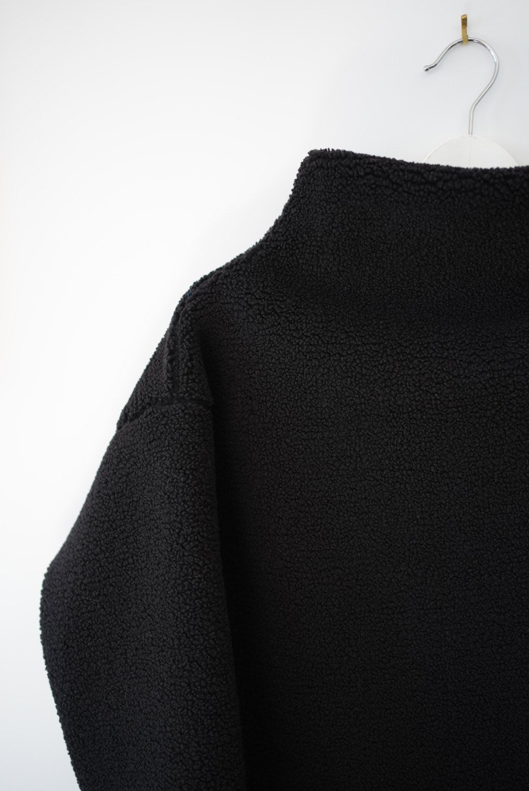 Black sherpa funnel neck top