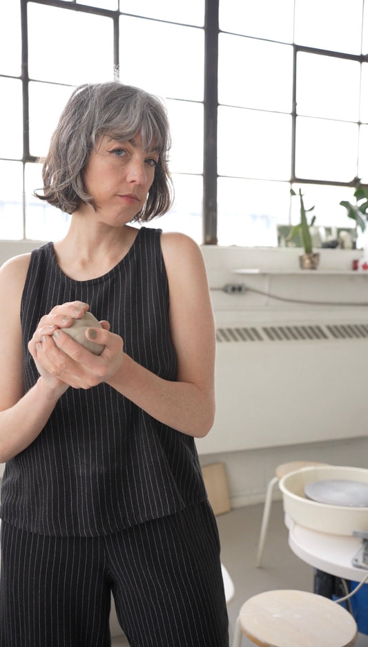 Black and white pinstripe sleeveless top