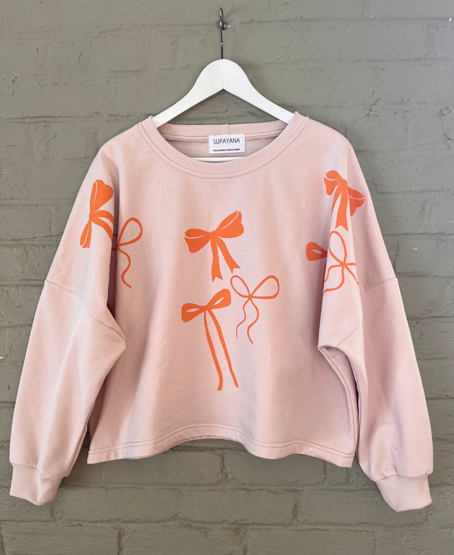 Organic cotton bow sweatshirt- size 1 (fits small through xl )